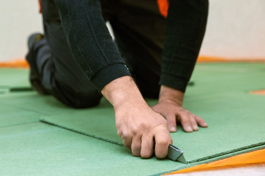 Choosing the Right Underlayment for Uneven Floors