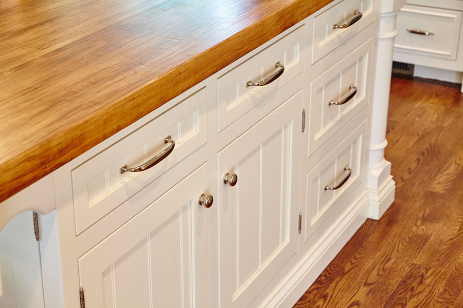 Should Flooring Go under Cabinets?